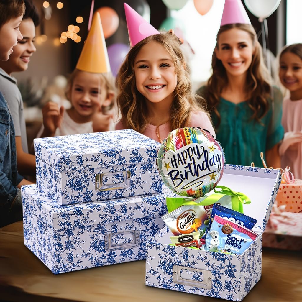 Birthday party scene with children and adults, featuring blue and white floral storage boxes filled with snacks and a 'Happy Birthday' balloon.