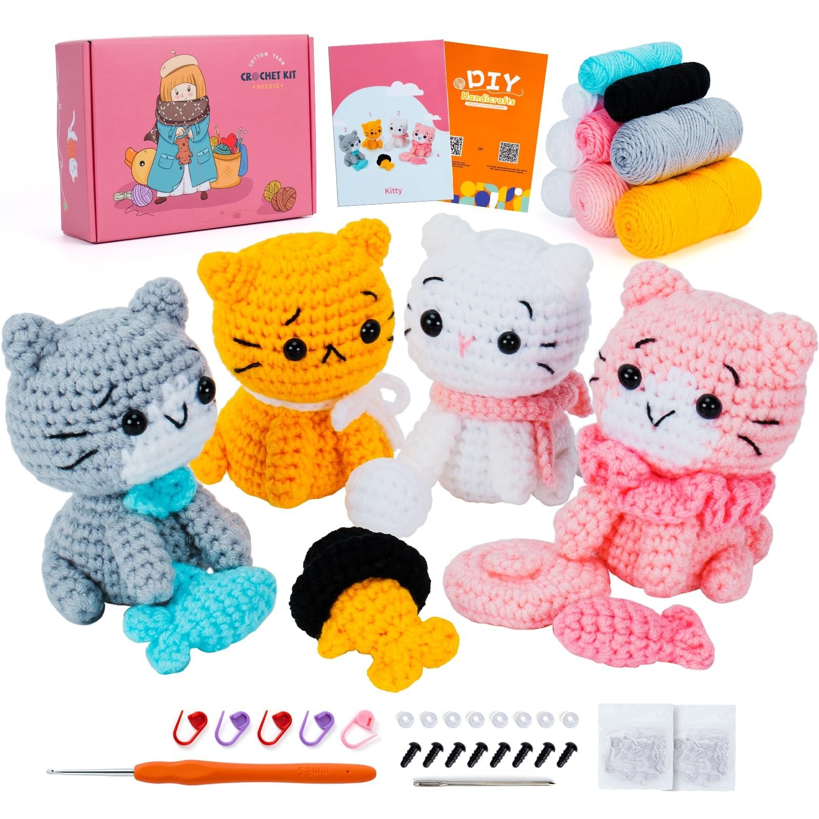 Four crocheted cat figures with yarn, crochet hook, needles, and accessories on a white background.