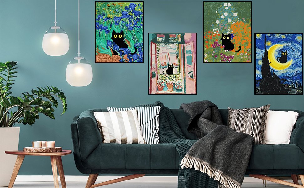 Four framed paint by number canvases featuring black cats displayed on a teal wall above a dark green sofa.