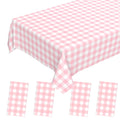 Pink gingham disposable plastic tablecloth and four matching napkins on a white background