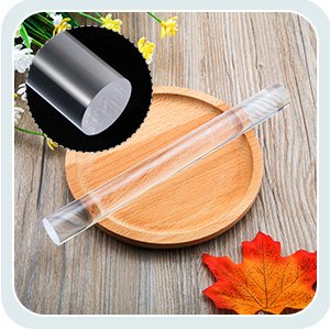 Clear acrylic rolling pin on a wooden plate with a close-up inset of the roller's end.