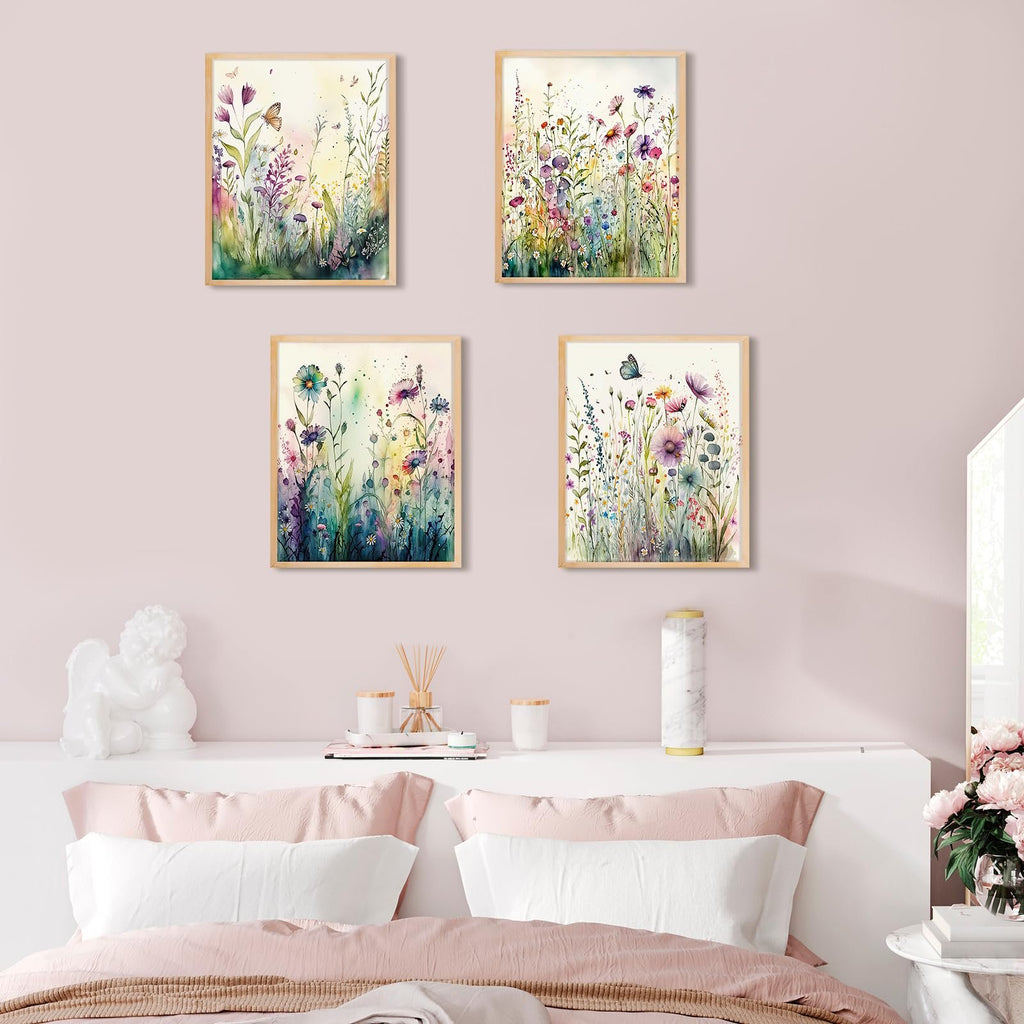 Four framed wildflower diamond art paintings displayed above a bed, showcasing colorful floral designs with butterflies.