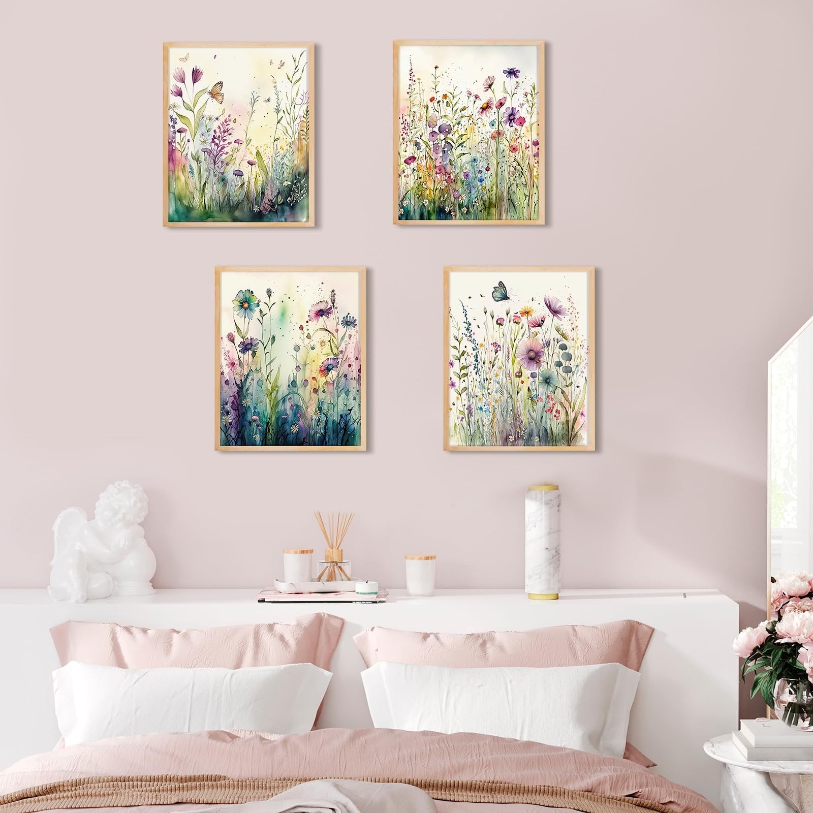 Four framed wildflower diamond art paintings displayed above a bed, showcasing colorful floral designs with butterflies.