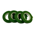 Four rolls of dark green floral tape arranged in a row against a white background.