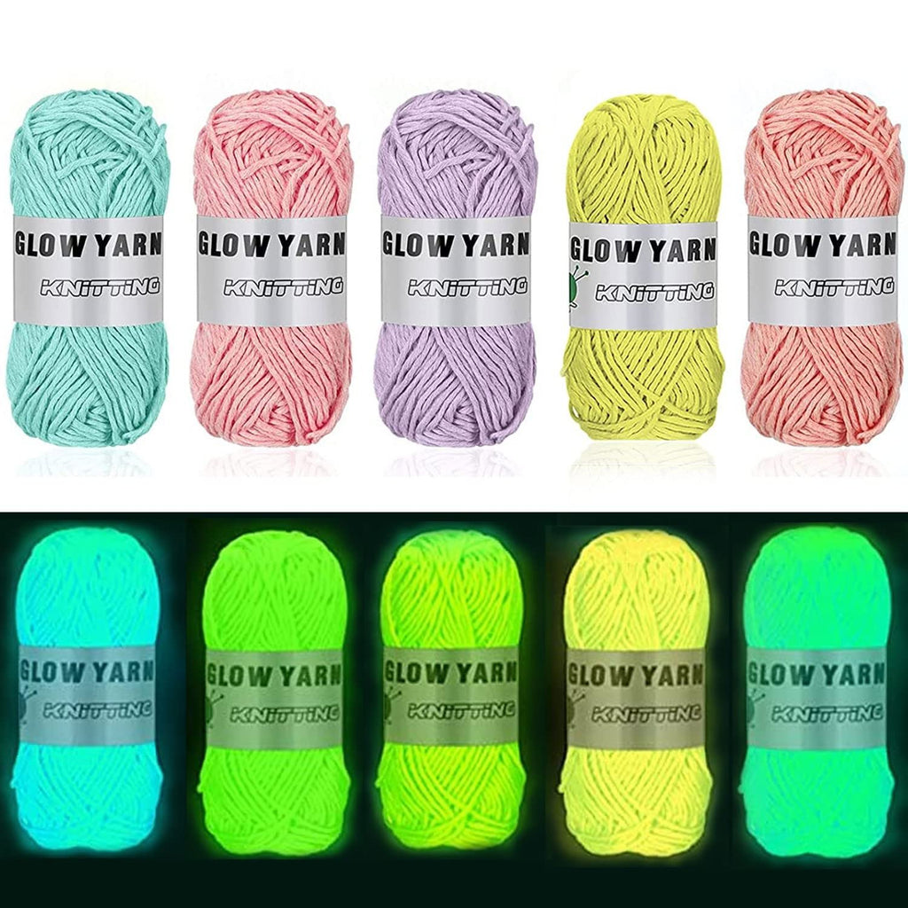 Five balls of glow-in-the-dark yarn in pastel colors and five balls in neon colors, all with knitting labels.