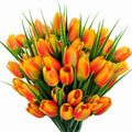 Bundle of 40 orange artificial tulips with green stems and leaves, presented against a white background.