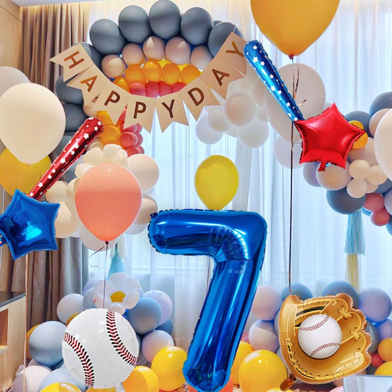 Blue number 7 balloon with baseball themed party decorations including foil baseball, glove, bat, and star balloons.
