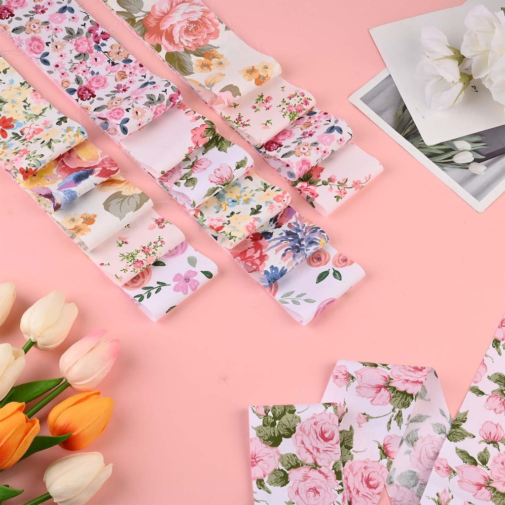 Collection of pink retro floral cotton fabric strips arranged on a pink background with tulips and a decorative card.