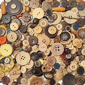Assortment of mixed vintage wood buttons with 2 and 4 holes, in brown and black colors.