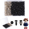 Set of black plastic safety eyes and washers for crafting, shown in a divided container and with a crochet doll.
