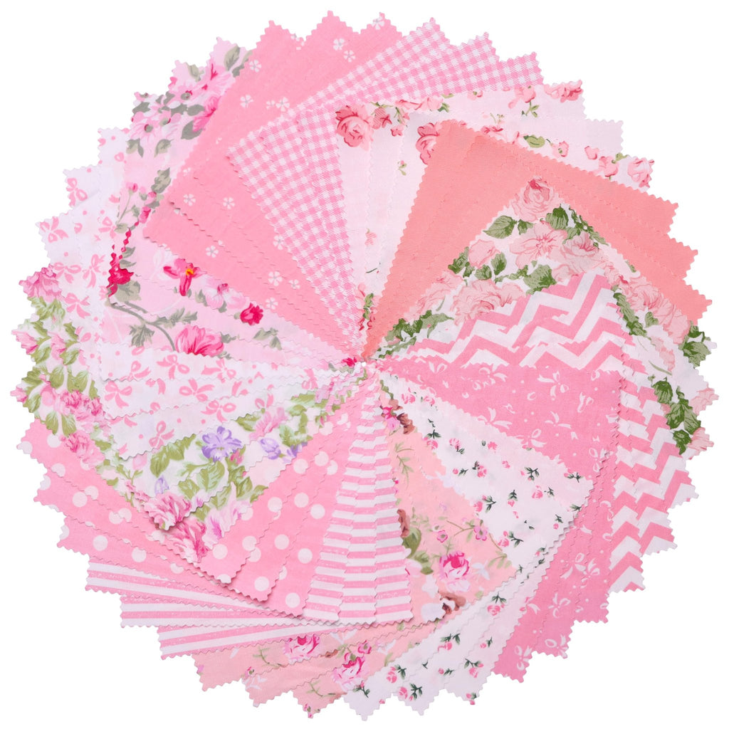Swirl of pink cotton quilt squares with various floral, gingham, polka dot, stripe, and chevron prints on a white background.