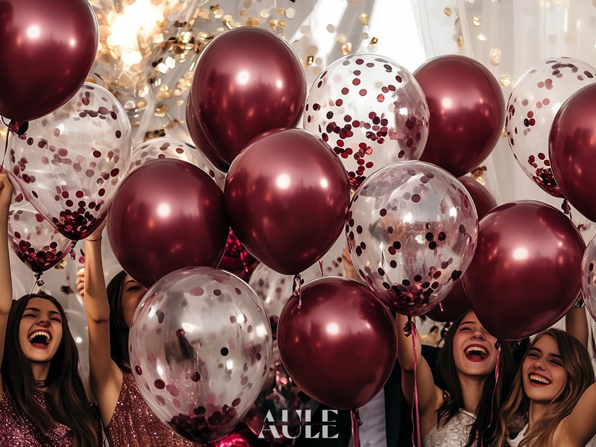 Burgundy and confetti balloons with people celebrating, logo in lower right corner
