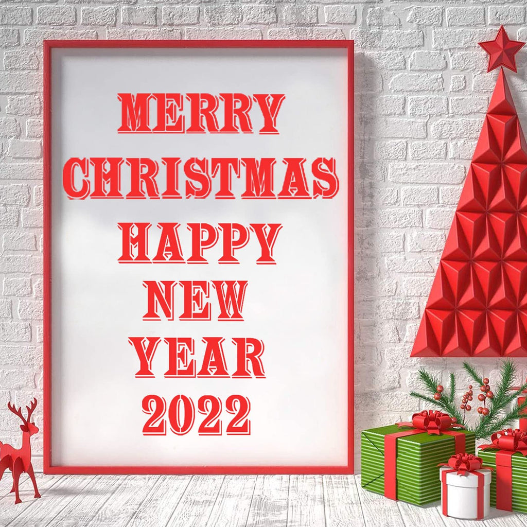 Framed sign with red text 'MERRY CHRISTMAS HAPPY NEW YEAR 2022' on white background, next to a red geometric Christmas tree and gifts.