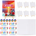 Art set with canvases, easels, acrylic paints, brushes, and trays. Includes a sample painting on an easel.