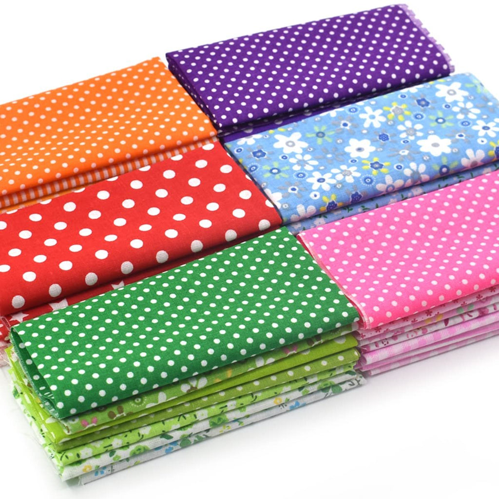 Stack of folded fabric squares in various colors and patterns including polka dots and floral prints.