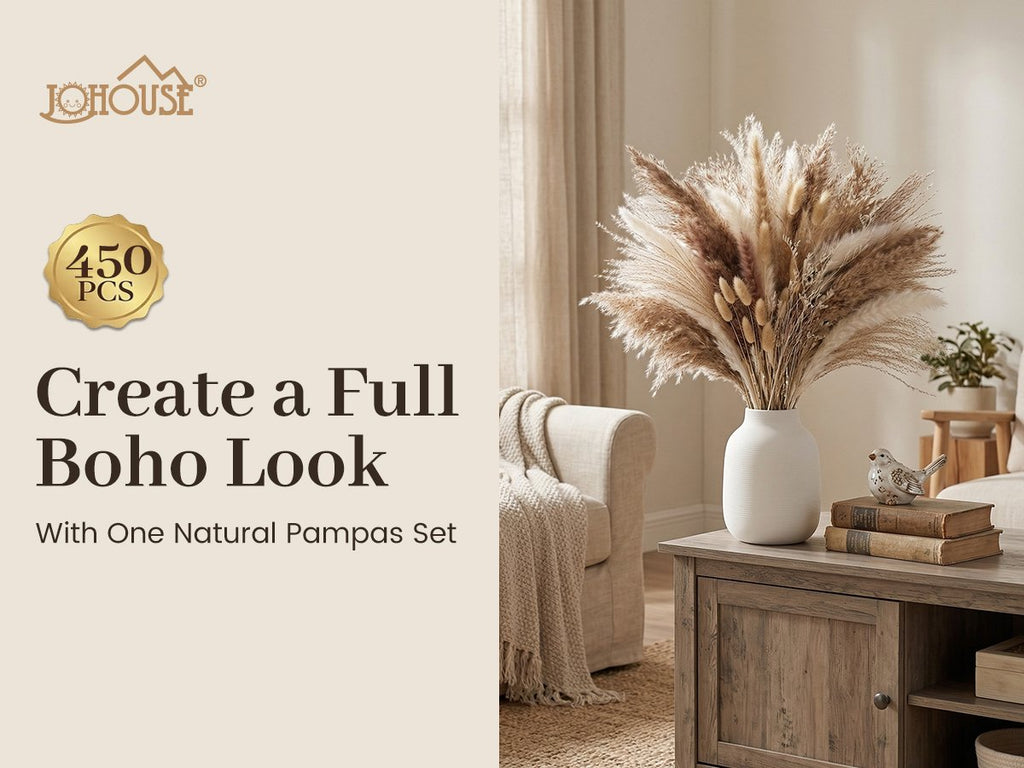 Boho dried pampas grass and bunny tail decor set in a white vase on a wooden cabinet.