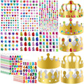 Gold paper crowns and sheets of colorful adhesive jewels, gems, stickers, letters, and numbers for DIY party hats.