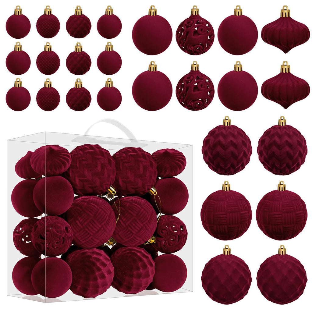 Burgundy flocked velvet Christmas ball ornaments in assorted sizes and textures, displayed in a clear box and scattered around.