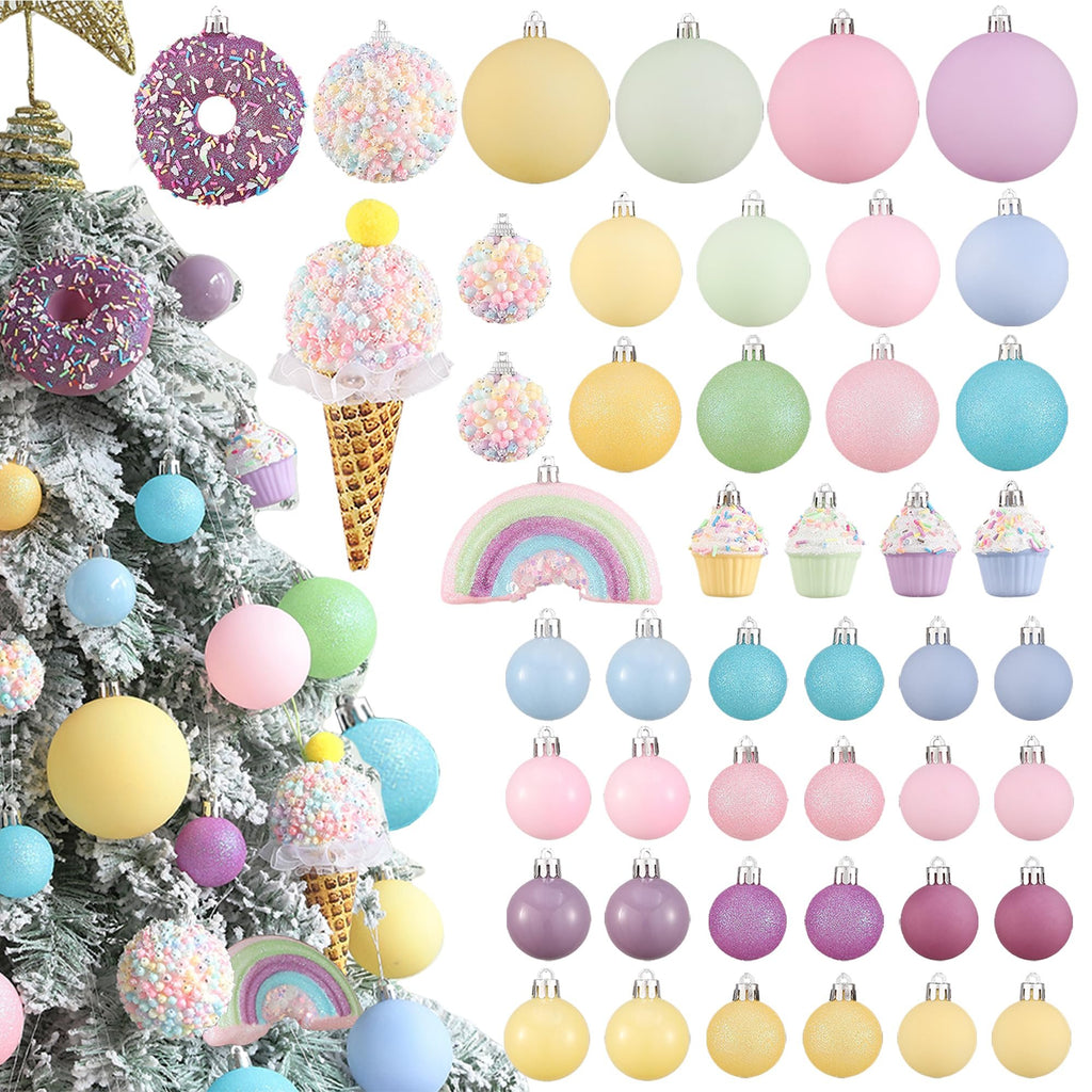 Pastel Christmas ornaments in various shapes including donuts, ice cream cones, cupcakes, rainbows, and round balls, displayed on a flocked tree and in rows.