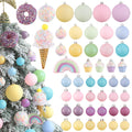 Pastel Christmas ornaments in various shapes including donuts, ice cream cones, cupcakes, rainbows, and round balls, displayed on a flocked tree and in rows.