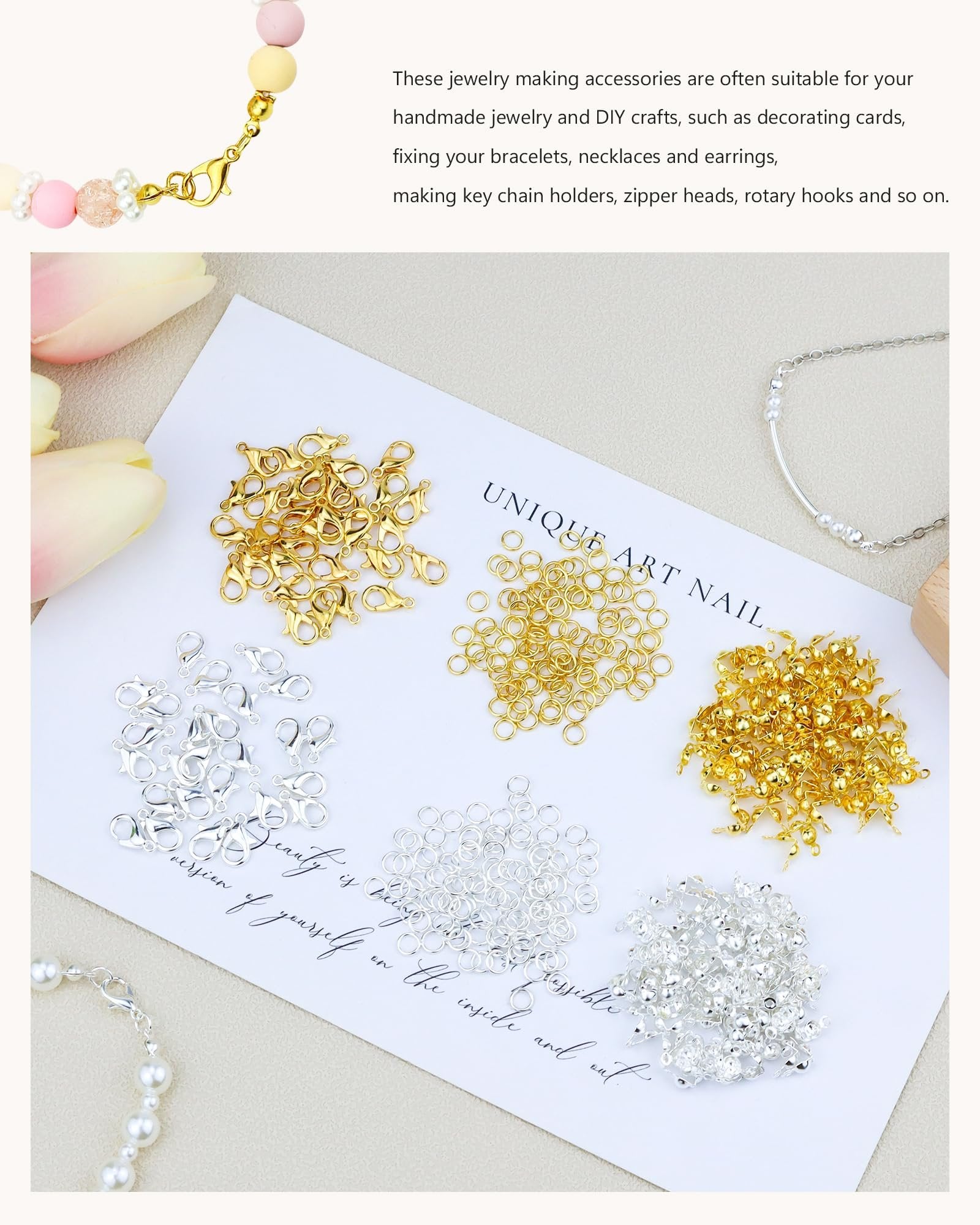 Assortment of gold and silver jewelry making findings including clasps, jump rings, and bead tips on a white card with text.