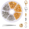 Jewelry making kit with gold and silver clasps, jump rings, crimp ends, and tweezers in a divided container.