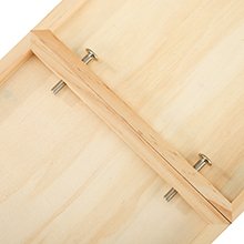 Back of a wooden porch sign showing construction with screws and wooden support beams.
