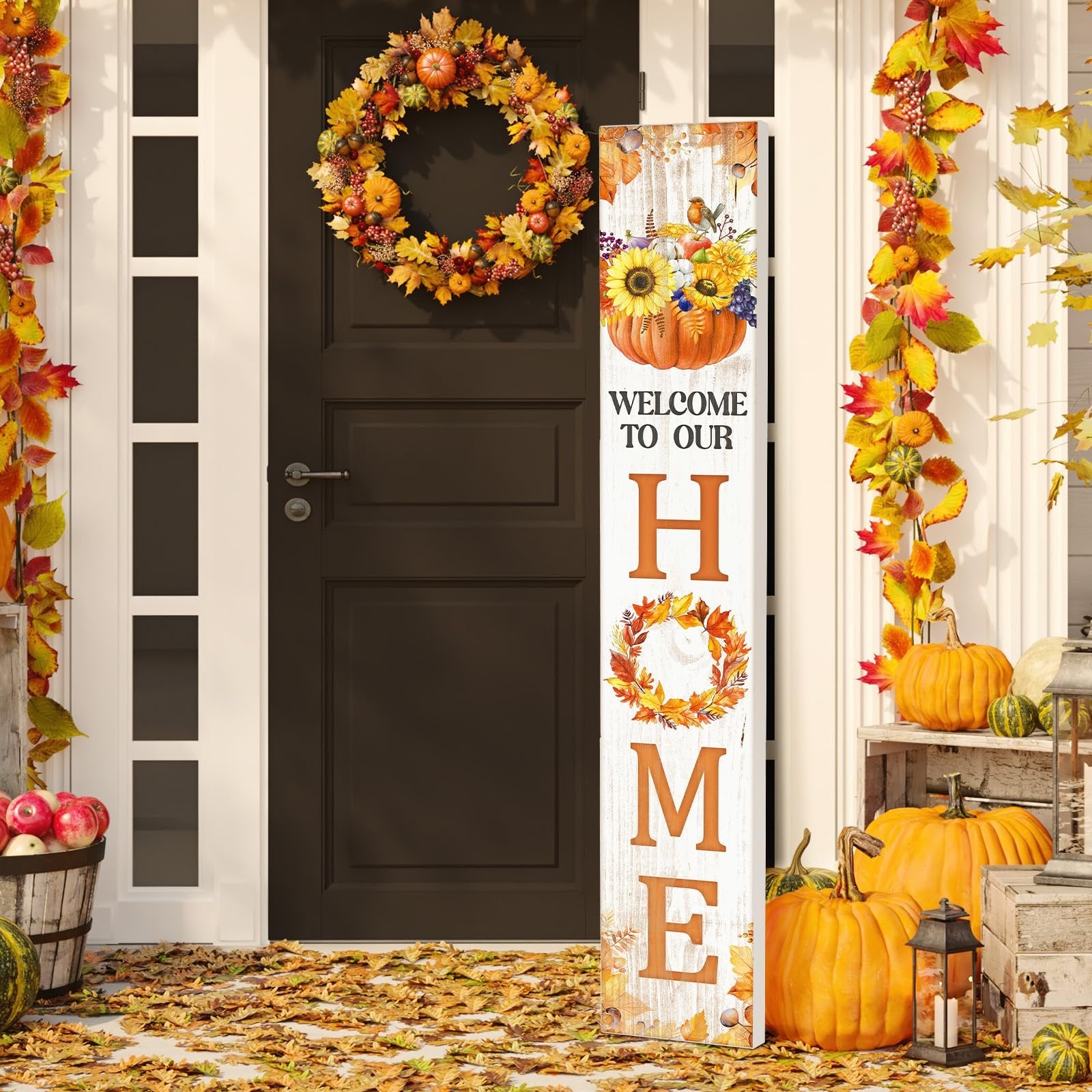 Vertical fall porch sign with sunflowers and pumpkins reading 'WELCOME TO OUR HOME' next to a front door with a wreath.