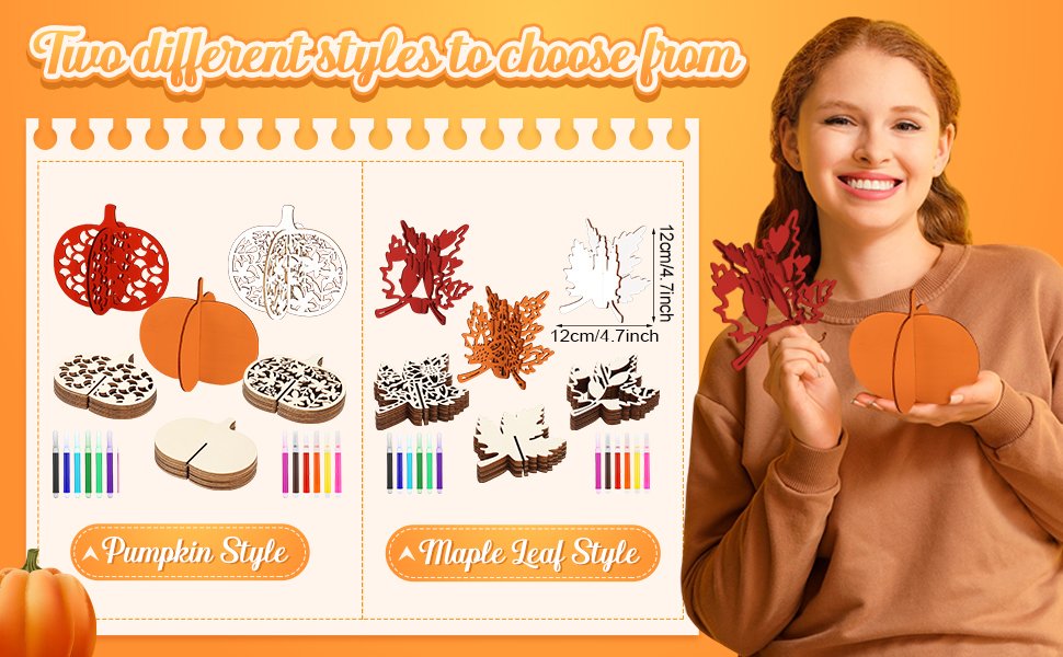 Woman holding a wooden pumpkin craft and a red maple leaf cutout, showcasing two styles of fall craft kits with markers.