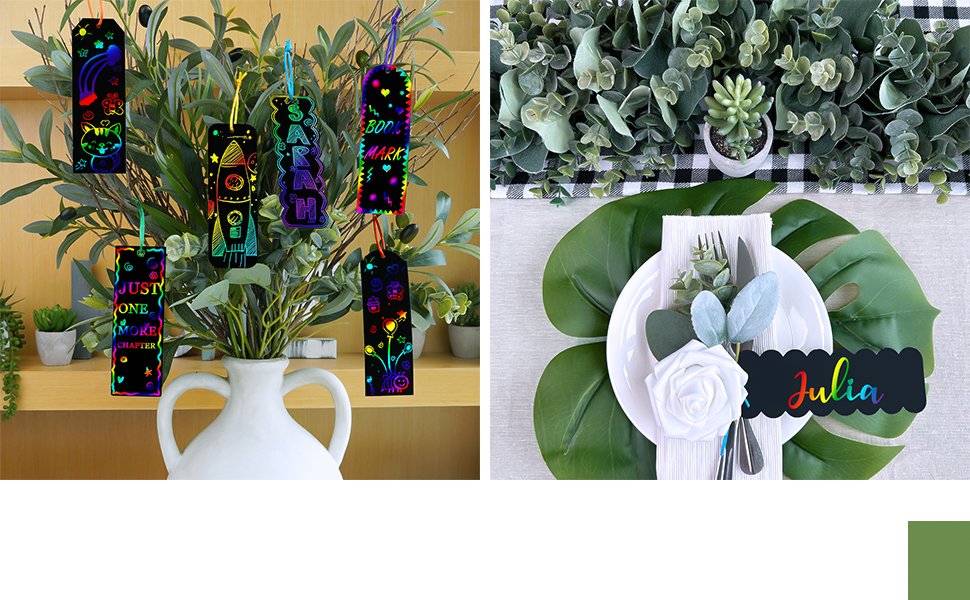 Rainbow scratch art bookmarks displayed in a vase of greenery and a place setting with a name card.