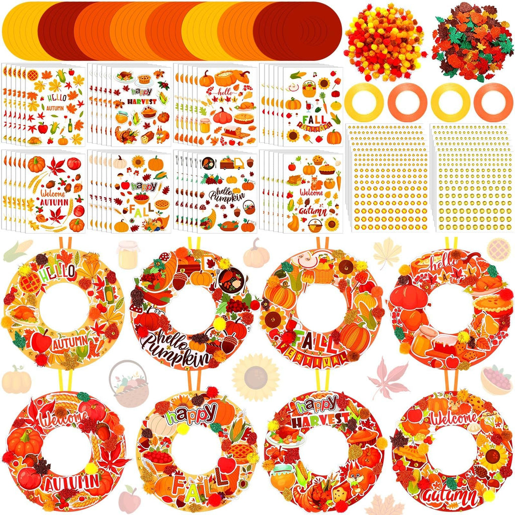 Autumn wreath craft kit components including cardboard circles, stickers, pom-poms, and ribbon, with four completed sample wreaths.