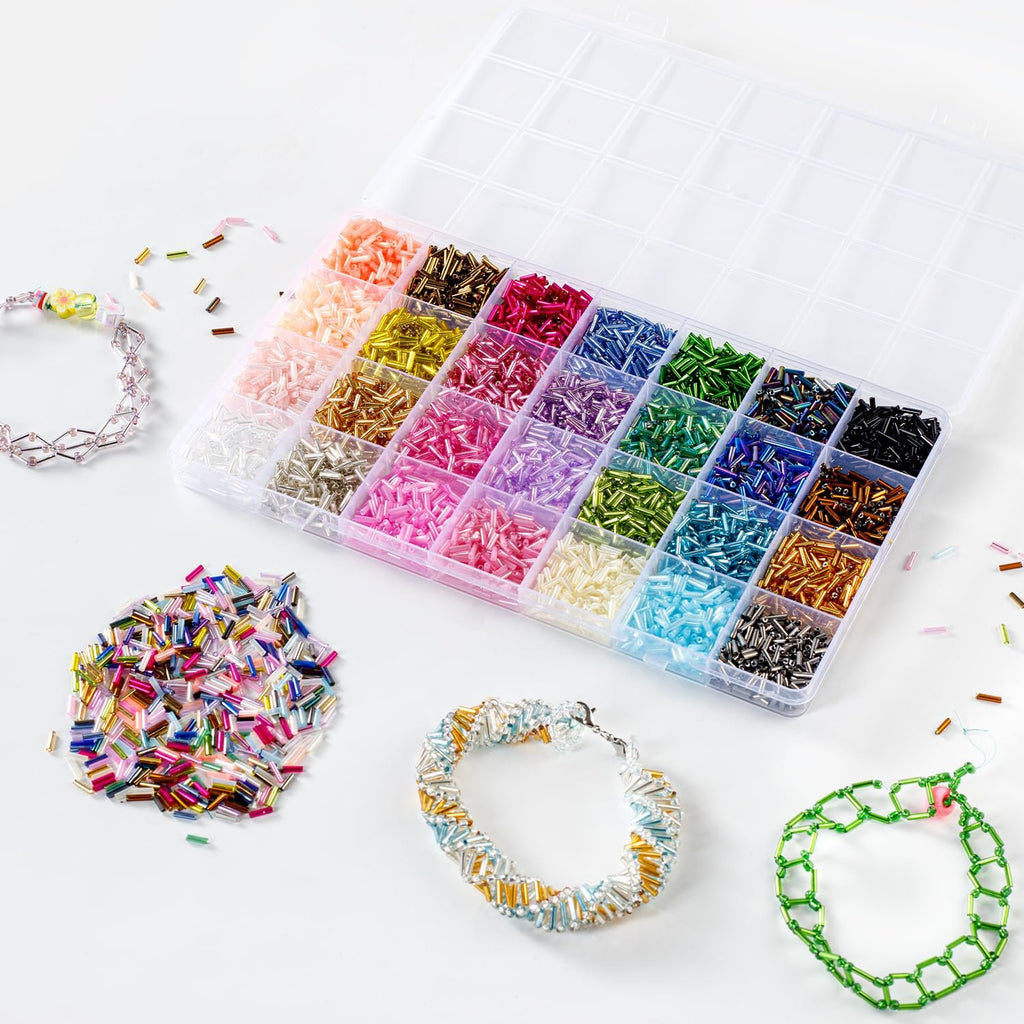 Glass tube beads in 28 colors organized in a clear plastic case with finished bracelets and loose beads scattered around.