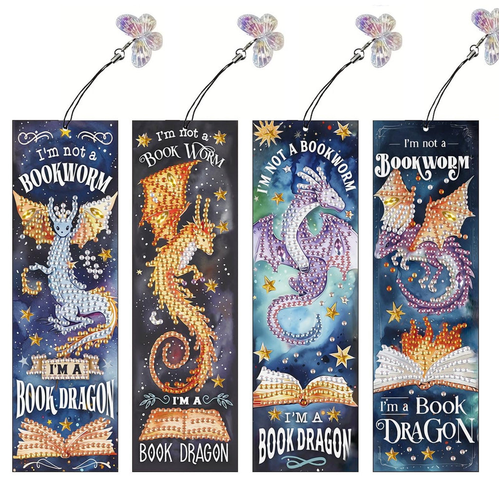 Four diamond art bookmark kits featuring dragons and open books, each with a rhinestone tassel.