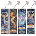 Four diamond art bookmark kits featuring dragons and open books, each with a rhinestone tassel.