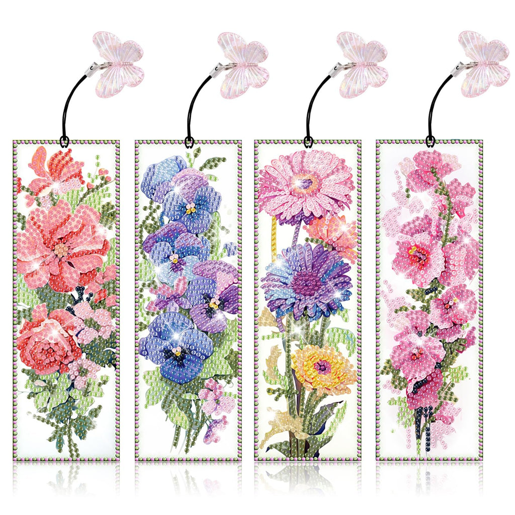 Four diamond art bookmarks featuring floral designs with butterfly charms attached.