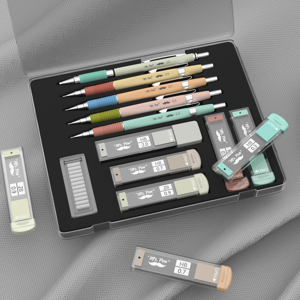 Set of five metal mechanical pencils and refill cartridges in a clear case, with lead sizes 0.3mm to 2.0mm.