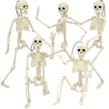 Five poseable Halloween skeletons arranged in a group against a white background.