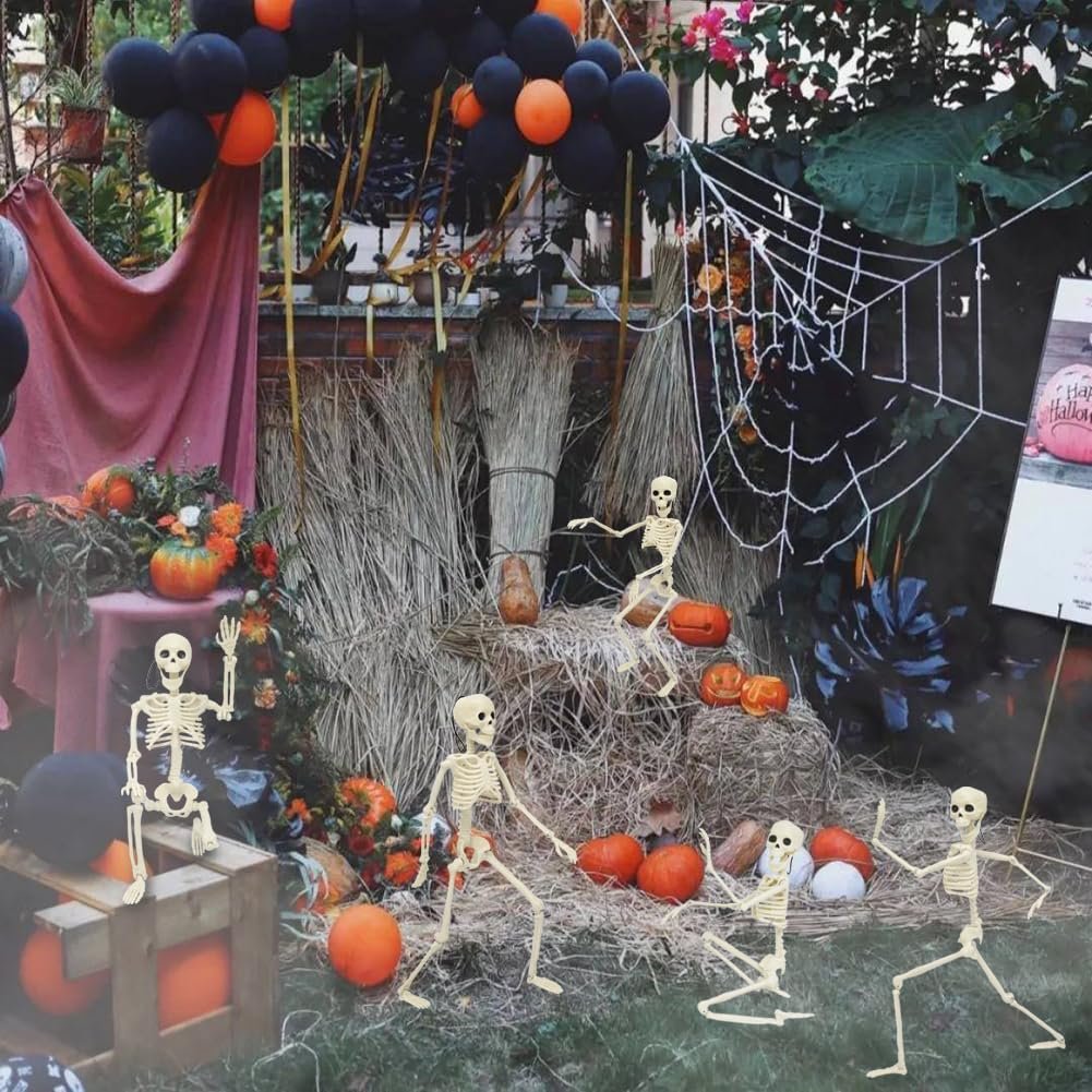 Halloween skeleton decorations with pumpkins and balloons in an outdoor setting
