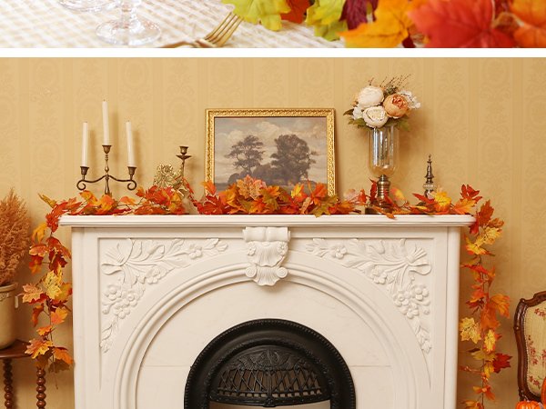 Artificial maple leaf garland draped over a white fireplace mantel with candles and a vase of flowers.