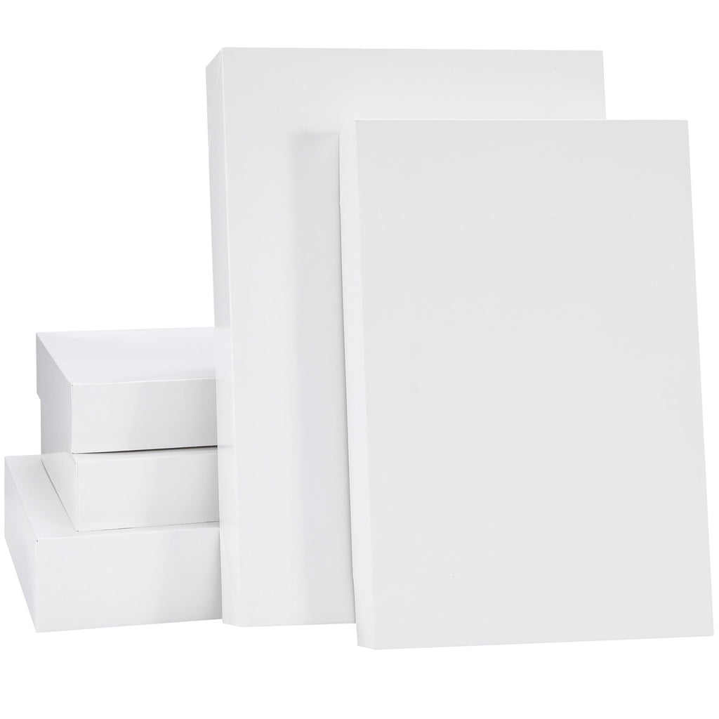 Five white gift boxes with lids stacked and arranged, showing assorted sizes on a white background.