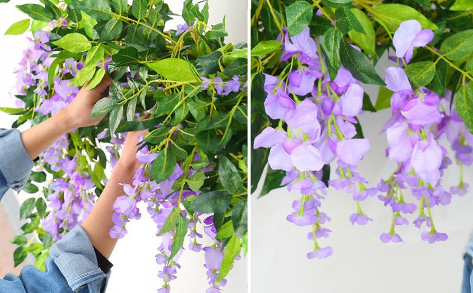 Close-up of purple wisteria flower garlands with green leaves, one section shows hands arranging the flowers.