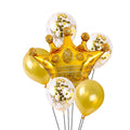 Gold foil crown balloon surrounded by gold and confetti balloons against a white background