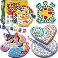 Stepping stones painting kit with unicorn, turtle, heart, emoji, and smiley face shapes, paints, and brushes.