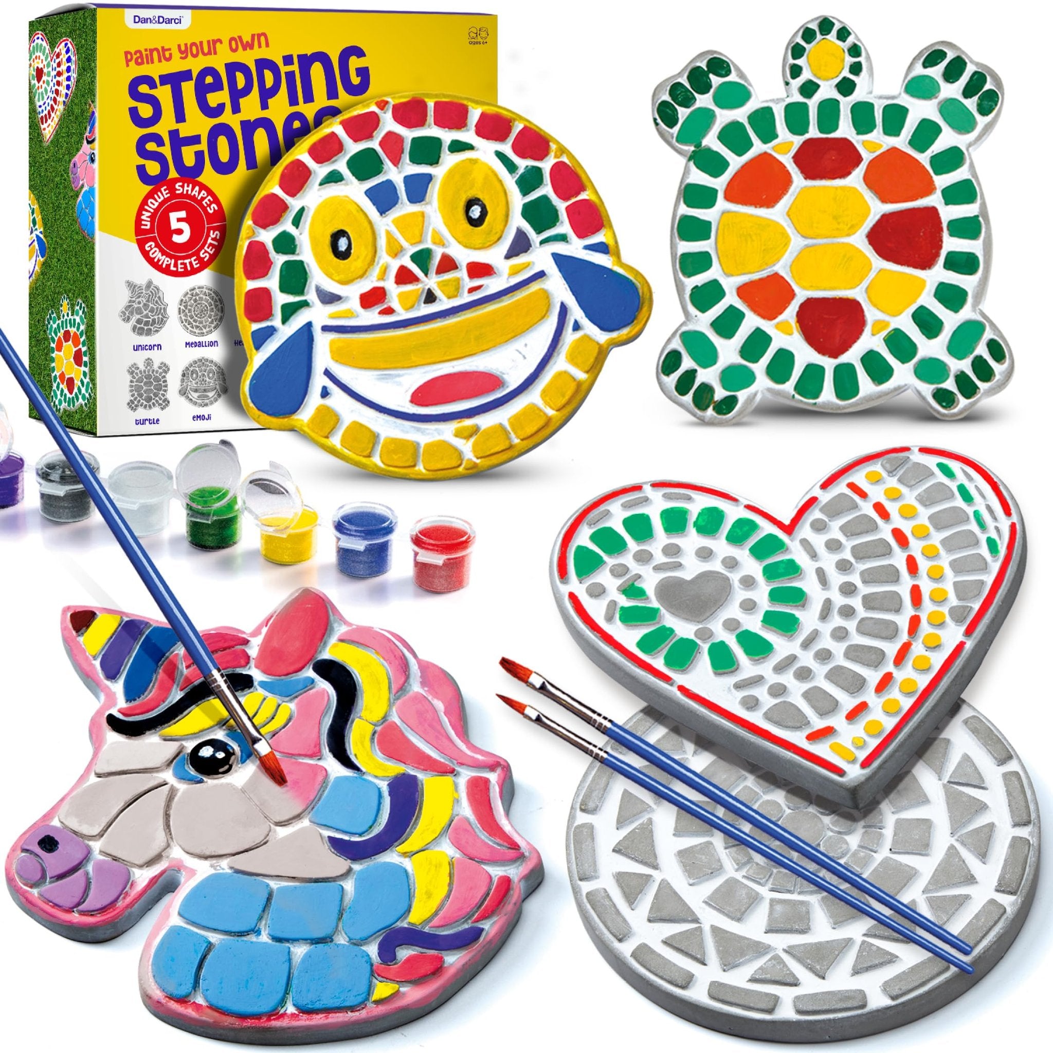 Stepping stones painting kit with unicorn, turtle, heart, emoji, and smiley face shapes, paints, and brushes.