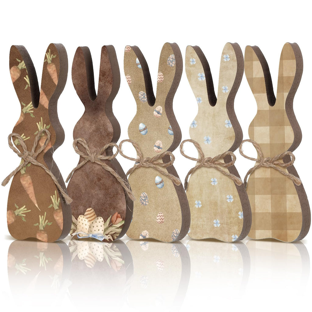 Five wooden Easter bunny table decor figures with twine bows, featuring carrot, egg, floral, and plaid patterns.