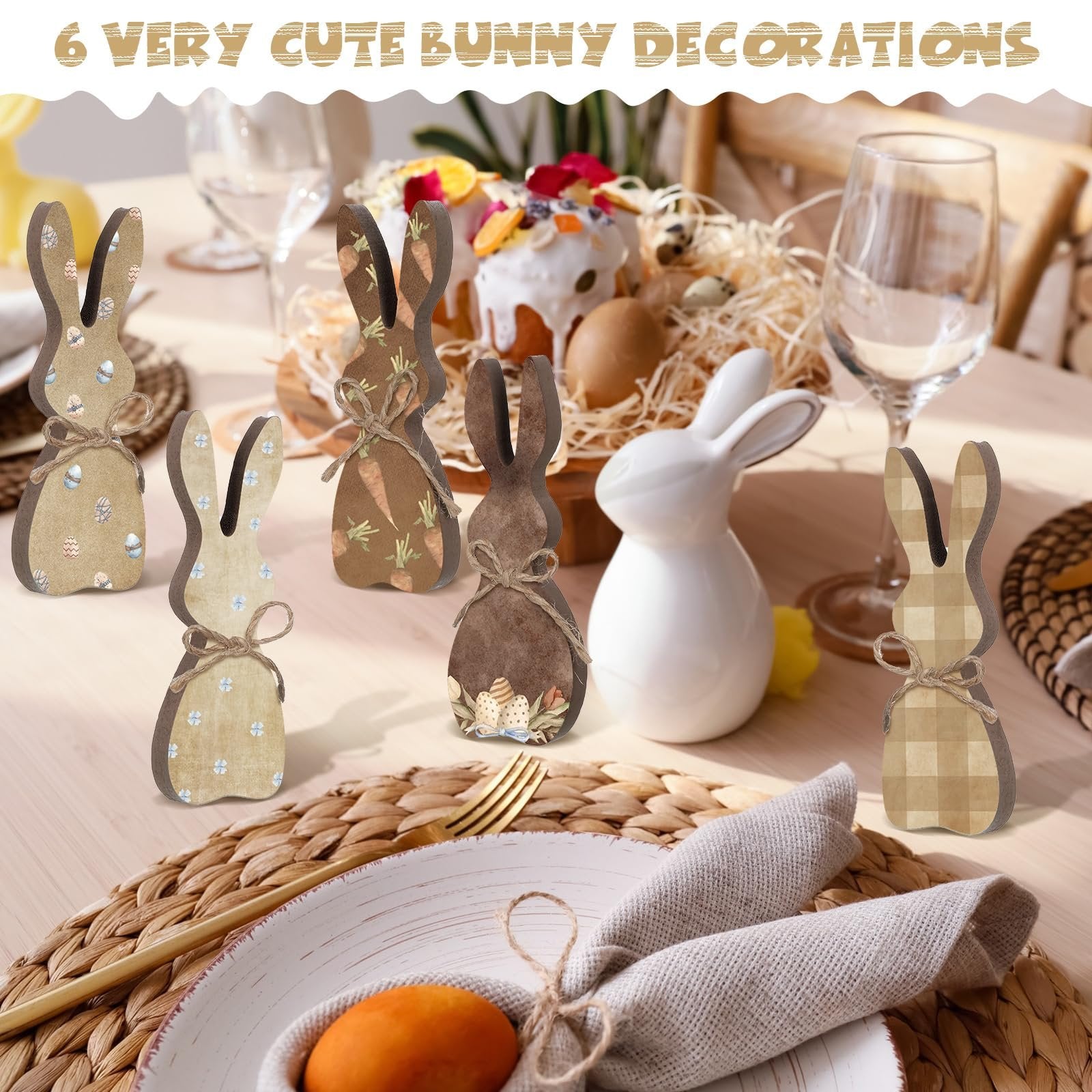 Easter table setting with six wooden bunny decorations, a cake, and white ceramic bunny figures.