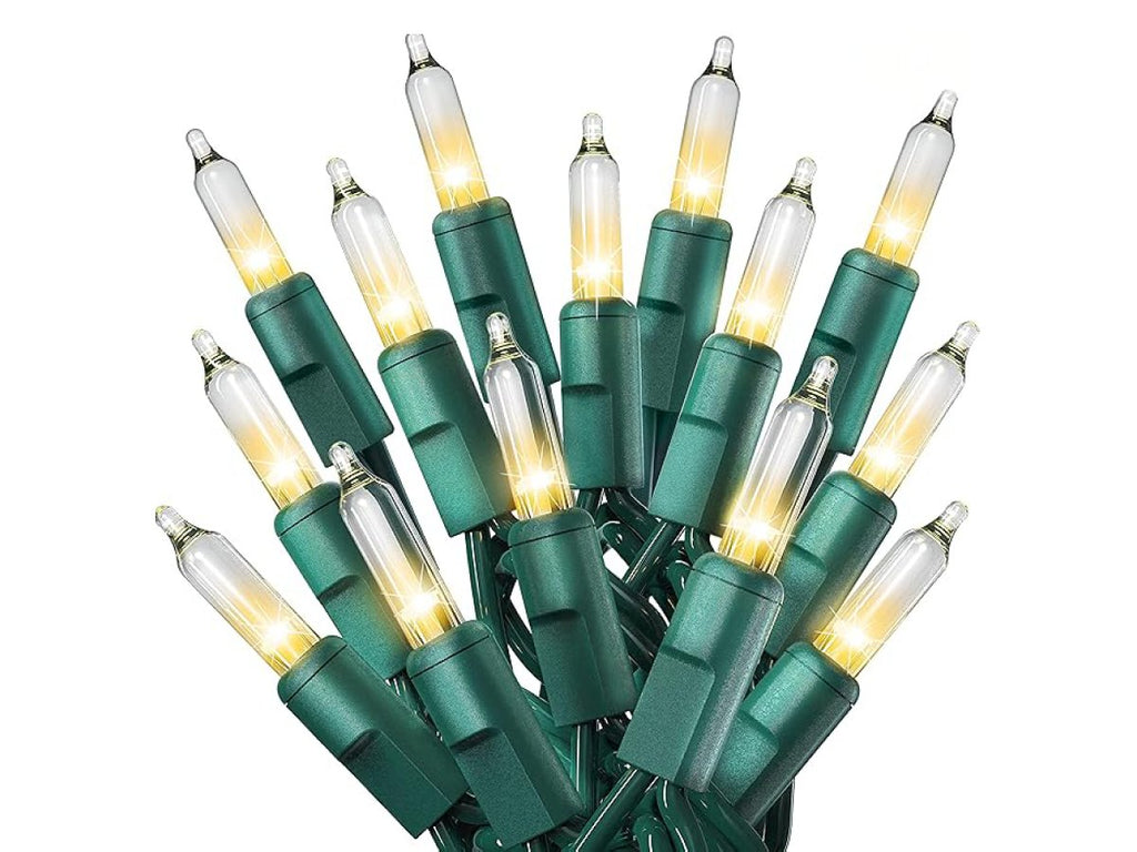 Cluster of 50 count warm white mini Christmas lights with green wire on a white background.