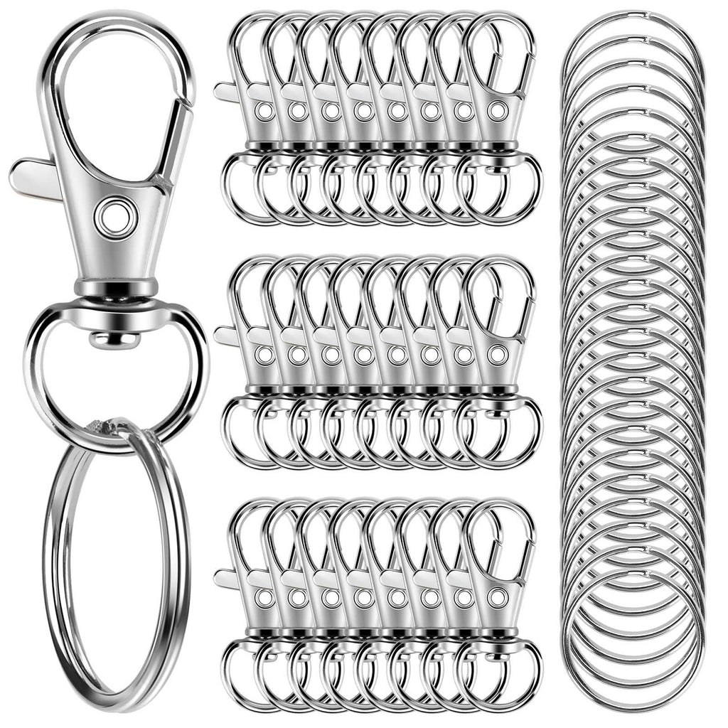 Silver zinc alloy lobster claw clasps and key rings arranged in rows, with a close-up of one clasp and ring on the left.