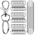 Silver zinc alloy lobster claw clasps and key rings arranged in rows, with a close-up of one clasp and ring on the left.
