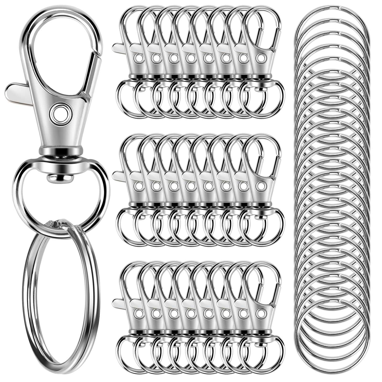Silver zinc alloy lobster claw clasps and key rings arranged in rows, with a close-up of one clasp and ring on the left.